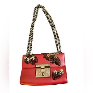 Authentic Gucci Red Leather Shoulder Bag with Gold Chain and Embellishments